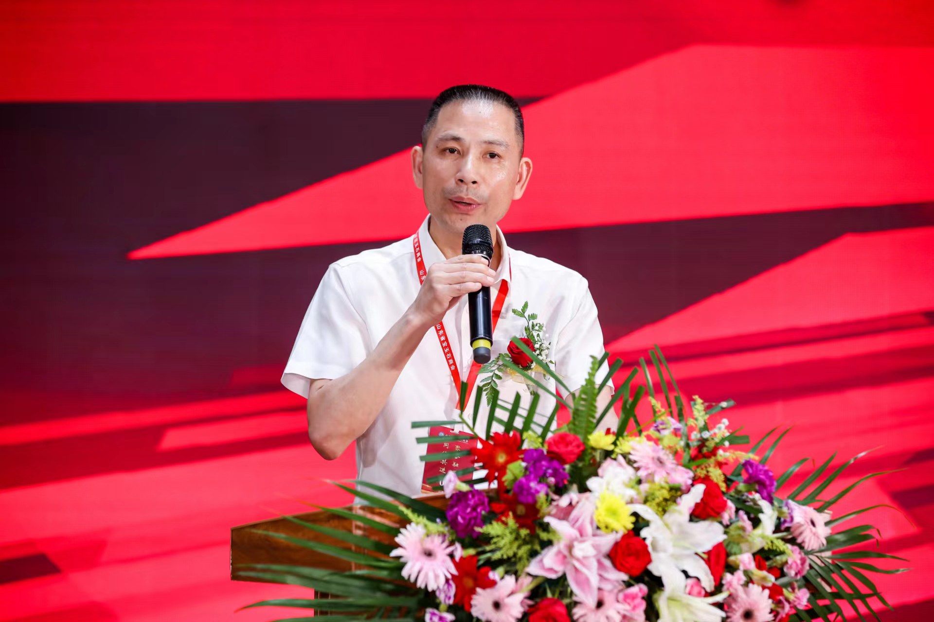 山东省宝玉石商会第二届理事会会长周而发致辞.jpg